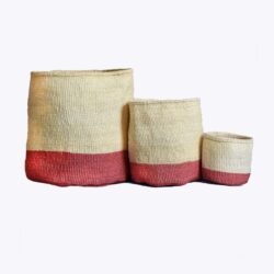 set of 3 hand woven Kenyan baskets in cream with pink colour block at the bottom