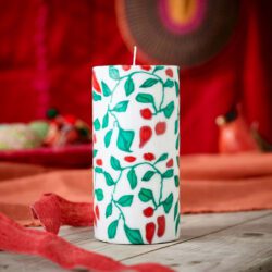 Large Swazi candle with christmas holly design