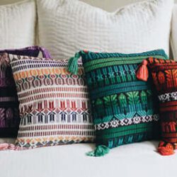 4 ethical cushions in different colours