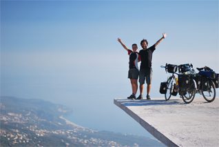 2 people standing at the edge of long drop in Albania